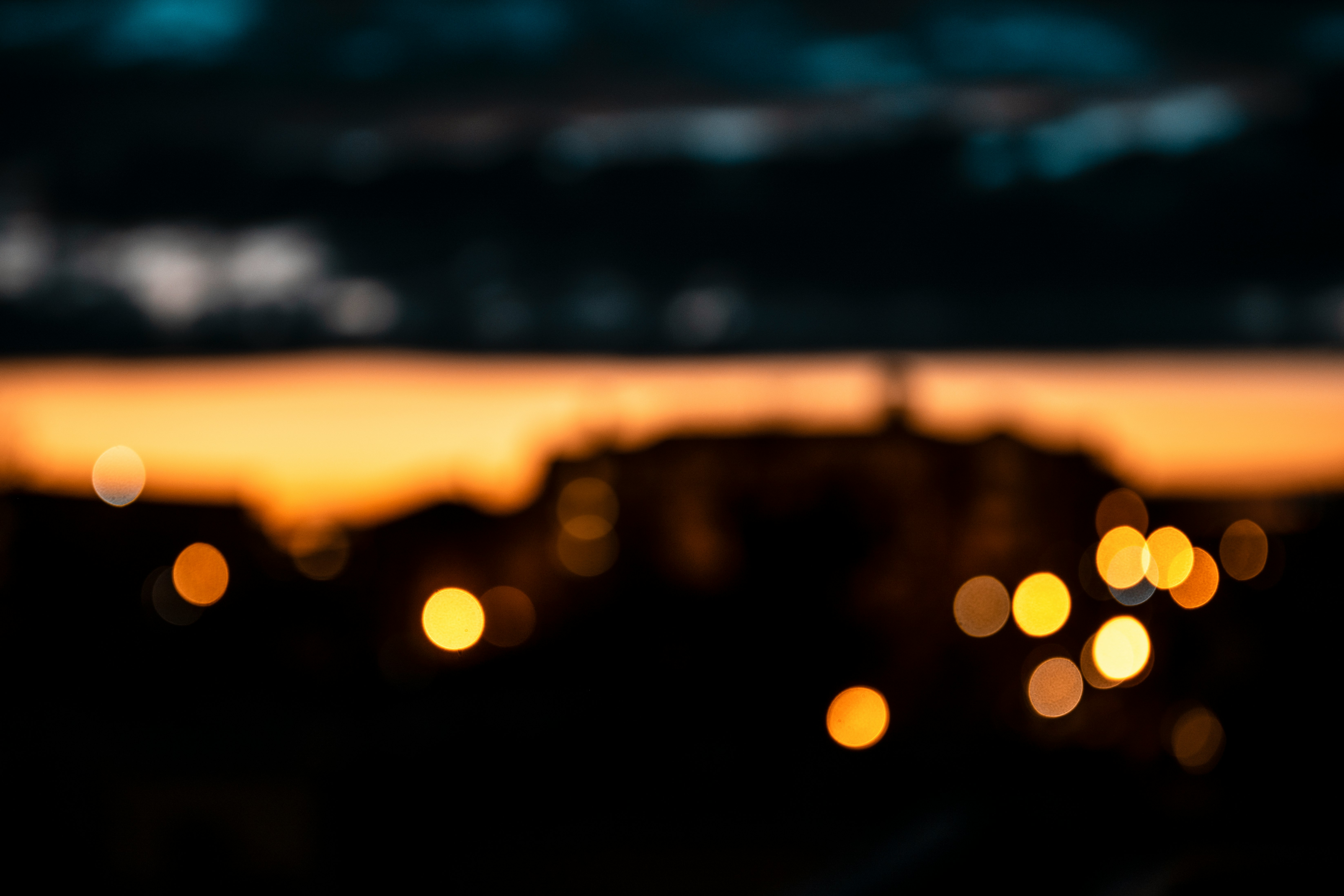 bokeh photography of city lights during night time